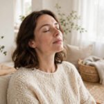Calm person taking a slow deep breath with eyes closed in a bright peaceful room, for how to stay calm under pressure